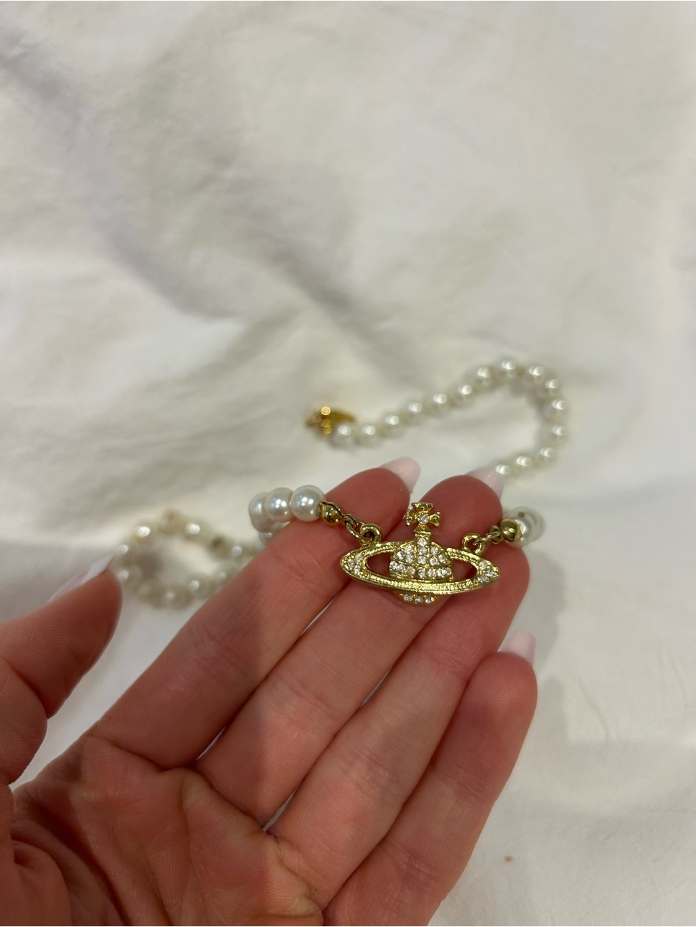 Vivienne Westwood White Pearl Necklace with Gold Orb Pendant